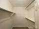 Walk-in closet with shelving and ample storage space for clothes and accessories at 709 Falls Church Rd, Charlotte, NC 28270