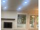 Spacious living room featuring a fireplace and a large sliding glass door at 709 Falls Church Rd, Charlotte, NC 28270