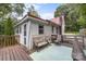 Wooden deck with seating provides a perfect spot to enjoy outdoor dining and relaxation at 727 W Main Street Ext, Lincolnton, NC 28092