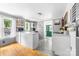 Charming kitchen featuring an island, white cabinets, and hardwood floors at 727 W Main Street Ext, Lincolnton, NC 28092