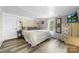 Inviting main bedroom with wood-style floors, bright windows, and a cozy atmosphere at 727 W Main Street Ext, Lincolnton, NC 28092