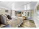 Comfortable main bedroom featuring wood floors, bright windows, and a relaxing atmosphere at 727 W Main Street Ext, Lincolnton, NC 28092