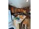 Functional kitchen features an island with bar seating at 7857 Petrea Ln, Charlotte, NC 28227