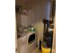 Laundry room featuring a washer and dryer with storage shelves at 7857 Petrea Ln, Charlotte, NC 28227