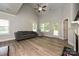 Inviting living room boasting vaulted ceilings, hardwood floors, and large windows for natural light at 8524 Loxton Cir, Charlotte, NC 28214