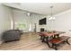 Spacious living room featuring a fireplace, vaulted ceilings, hardwood floors and comfortable seating at 8524 Loxton Cir, Charlotte, NC 28214