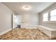 Bright dining room featuring neutral walls, built-in bench seating, and a classic light fixture at 903 Rhode Island Ave, Kannapolis, NC 28083