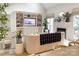 Bright living room with fireplace, built-in shelving, and stylish décor creating an inviting atmosphere at 9604 Oliver Ct, Harrisburg, NC 28075