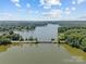 Breathtaking aerial view of a serene lake, showcasing the expansive water and surrounding trees at 1019 Westlake Dr, Kannapolis, NC 28081