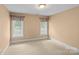 Bedroom with two windows providing natural light and neutral paint at 1019 Westlake Dr, Kannapolis, NC 28081