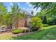 Beautiful brick home showcasing a well-maintained lawn and landscaping at 1019 Westlake Dr, Kannapolis, NC 28081