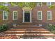 Charming brick home featuring a grand entrance with steps and iron railing at 1019 Westlake Dr, Kannapolis, NC 28081
