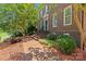 Brick house with manicured landscaping, walkway, and lush green lawn at 1019 Westlake Dr, Kannapolis, NC 28081