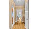 Hallway with wooden floors leading to rooms and kitchen at 1019 Westlake Dr, Kannapolis, NC 28081