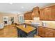 Gourmet kitchen featuring custom wood cabinetry, island, and modern stainless appliances at 1019 Westlake Dr, Kannapolis, NC 28081