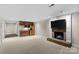 Living room with brick fireplace and wet bar at 1019 Westlake Dr, Kannapolis, NC 28081