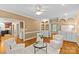 Inviting living room featuring hardwood floors, stylish furnishings, and custom built-in shelving at 1019 Westlake Dr, Kannapolis, NC 28081