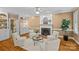 Cozy living room with a brick fireplace, built-in cabinets, and comfortable seating arrangement at 1019 Westlake Dr, Kannapolis, NC 28081