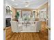 Inviting living room with hardwood floors, fireplace, and French doors that offer abundant natural light at 1019 Westlake Dr, Kannapolis, NC 28081