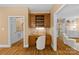 Hallway home office nook featuring custom wood cabinetry, drawers, and shelving at 1019 Westlake Dr, Kannapolis, NC 28081