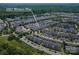 This is an aerial view of the home's location in a neighborhood with lush, green trees at 1027 Writers Way, Cornelius, NC 28031