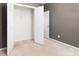 Bedroom closet with open doors provides ample storage space in the home at 1027 Writers Way, Cornelius, NC 28031