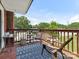 Cozy balcony with outdoor furniture, offering a relaxing space with neighborhood views at 1102 Lane St, Kannapolis, NC 28083