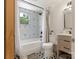 Modern bathroom featuring geometric tilework, updated fixtures, and a tub-shower combo at 1102 Lane St, Kannapolis, NC 28083