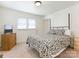 Bright bedroom with neutral carpet features a bed, a dresser, and natural light at 1102 Lane St, Kannapolis, NC 28083