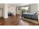 Spacious main bedroom with hardwood floors, sitting area, walk-in closet, and private balcony at 1102 Lane St, Kannapolis, NC 28083