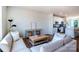 Cozy living room with comfortable seating and an open floor plan to the kitchen at 11021 Warfield Ave # 03, Huntersville, NC 28078
