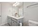Bright bathroom with dual sinks, spacious countertops, a large mirror, and modern fixtures at 13323 Savaine St, Charlotte, NC 28278