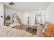 Open living room featuring hardwood flooring and plenty of natural light at 13323 Savaine St, Charlotte, NC 28278