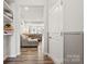 Inviting open-concept living space showcasing hardwood floors and modern finishes at 13323 Savaine St, Charlotte, NC 28278