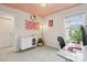 Charming home office featuring playful decor, ample lighting, and a comfortable workspace at 13323 Savaine St, Charlotte, NC 28278