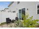Cozy patio with comfortable seating and well-kept landscaping at 13323 Savaine St, Charlotte, NC 28278