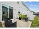 Relaxing patio space with comfortable seating and potted plants, perfect for outdoor enjoyment at 13323 Savaine St, Charlotte, NC 28278