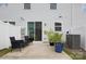 Private patio with outdoor seating, perfect for relaxing or entertaining at 13323 Savaine St, Charlotte, NC 28278