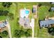 Aerial view of house and neighborhood with a pool at 13733 Castleford Dr, Mint Hill, NC 28227