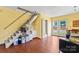 Open living room with staircase and backyard access at 13733 Castleford Dr, Mint Hill, NC 28227