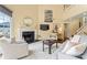 Cozy living room featuring a fireplace, comfortable seating, and modern decor at 13733 Castleford Dr, Mint Hill, NC 28227