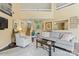 Spacious living room with stairs, open floor plan, and lots of light at 13733 Castleford Dr, Mint Hill, NC 28227