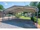 Spacious carport offering sheltered parking and extra storage space at 1553 Home Trl # 51, Lincolnton, NC 28092