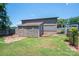 Exterior view of the property featuring a shed and green space, showcasing its size and character at 1553 Home Trl # 51, Lincolnton, NC 28092