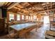 Spacious workshop with abundant lighting, worktables, and ample storage for various projects at 1553 Home Trl # 51, Lincolnton, NC 28092