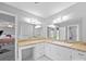 Bright bathroom area with double mirrors, long counter and sink at 1904 Old Peachland Rd, Marshville, NC 28103