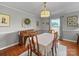 Inviting dining room with a piano, table set for dinner, and lots of natural light at 1904 Old Peachland Rd, Marshville, NC 28103