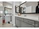 Elegant bathroom showcasing double vanities, framed mirrors, and neutral color scheme at 200 Squash Harvest Ct, Matthews, NC 28104