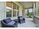 Charming front porch with comfortable seating perfect for relaxing outdoors at 200 Squash Harvest Ct, Matthews, NC 28104
