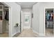 A hallway with access to two walk in closets at 200 Squash Harvest Ct, Matthews, NC 28104